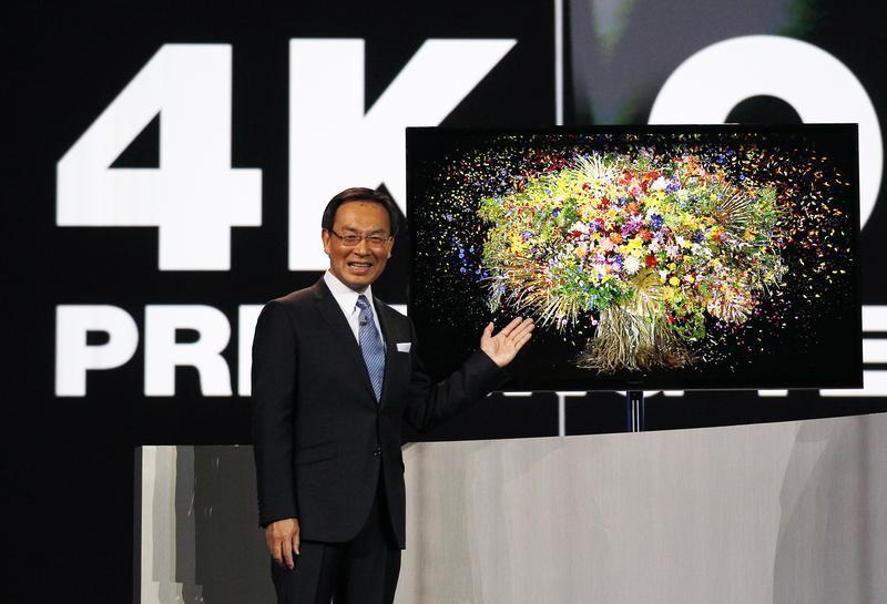 Panasonic chief Tsuga introduces the company's new OLED television during the Panasonic opening day keynote at the Consumer Electronics Show in Las Vegas